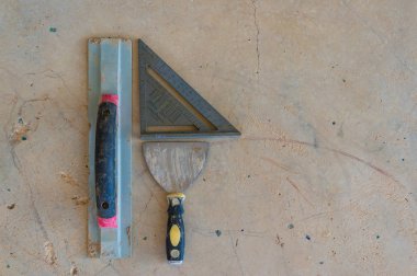 Palet bıçağı, kare ve ölçer ininşaat araçları arka plan