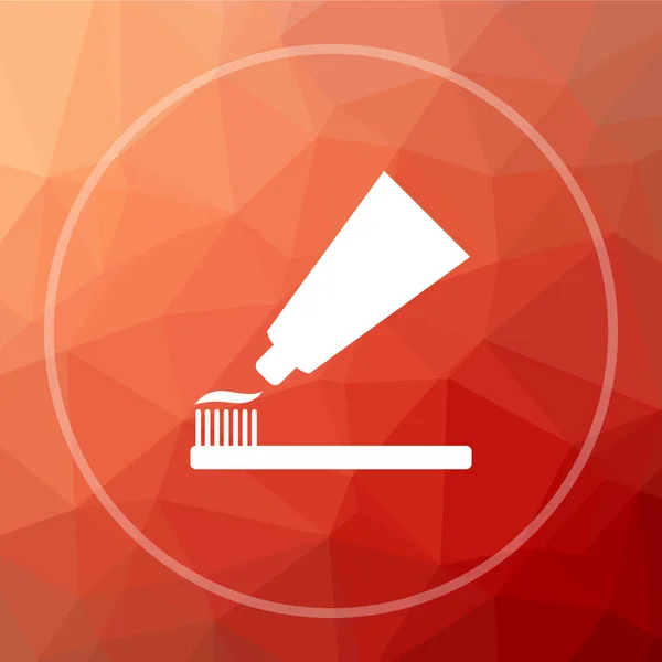 Tooth paste and brush icon. Tooth paste and brush website button on red low poly background