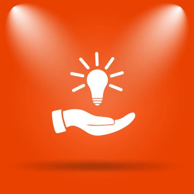 El tutma ampul. Fikir simgesi. Internet düğmesini turuncu zemin üzerine