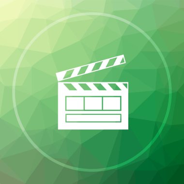 Film simgesi. Film Web sitesi düğmesini yeşil düşük poli arka plan üzerinde