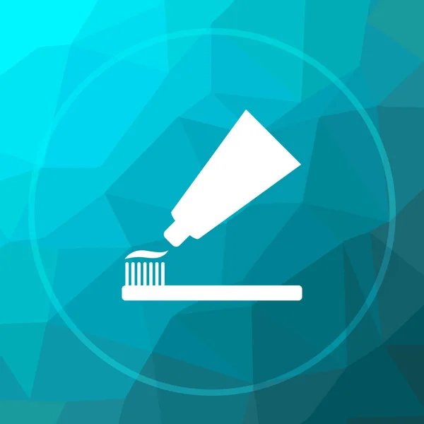 Tooth paste and brush icon. Tooth paste and brush website button on blue low poly background
