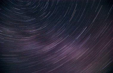 Starry sky shot at a long exposure. clipart
