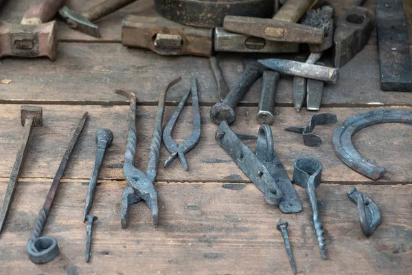 Set of ancient tools for metal forging.