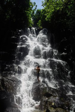 Kanto lampo waterfall in indonesia. Bali.
