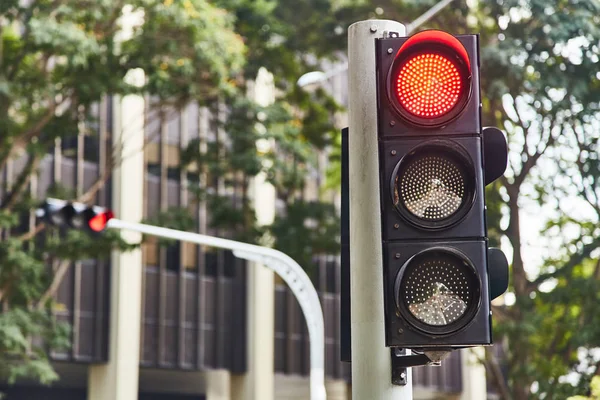 Red traffic signal signal. Singapore. Close-up