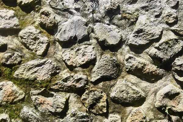 Texture of a stone wall. Old castle stone wall texture background. Stone wall as a background or texture.