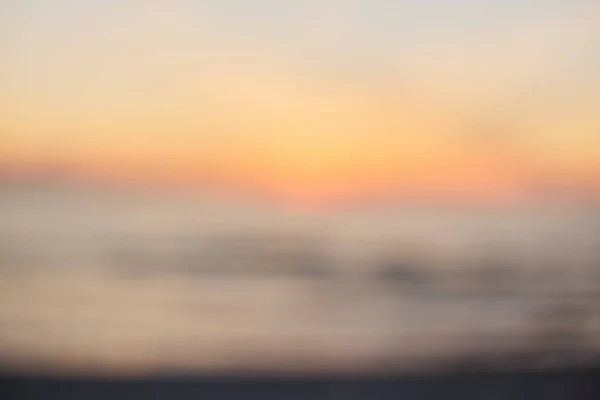 Пляж захода солнца с боке световой волны абстрактный фон . — стоковое фото