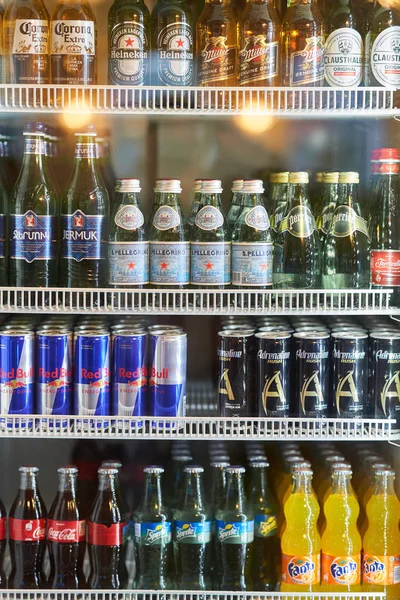 Moscow, Russia - 9 August, 2019: Various of soft drinks, waters, soda, milks and beers are sale on the refrigerator cooler shelf in a hypermarket. — Stock Photo, Image
