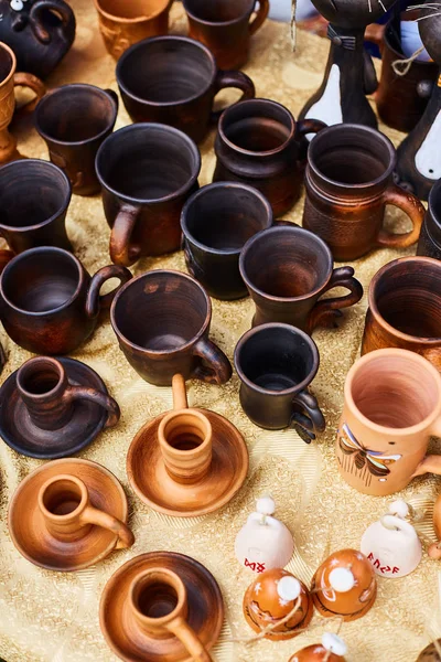 Handmade pottery. Clay dishes close up. Handicraft Exhibition
