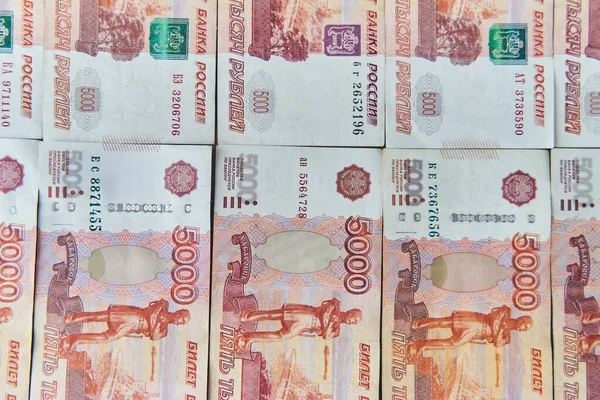 Money on Russia. Close-up of Russian rubles on five thousand and one thousand banknotes. Finance concept. — Stock Photo, Image