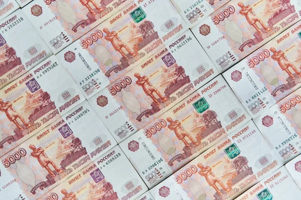 Money on Russia. Close-up of Russian rubles on five thousand and one thousand banknotes. Finance concept. — Stock Photo, Image