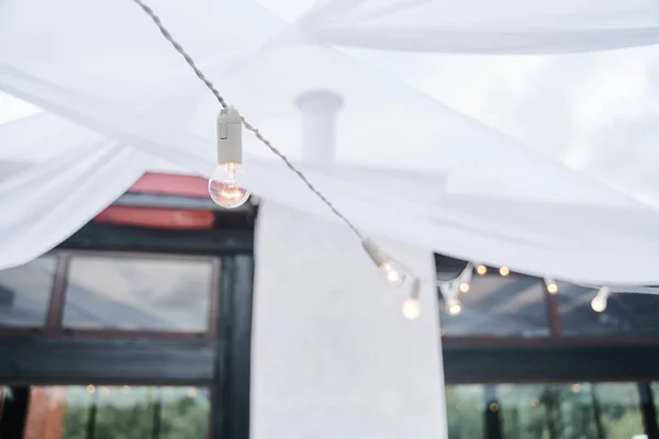 Light bulb decor in an outdoor party — Stock Photo, Image