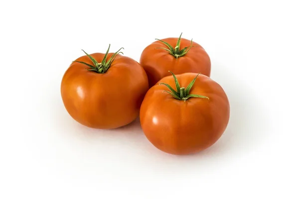 Three Beautiful Red Tomatoes Lie White Isolated Background — Stock Photo, Image