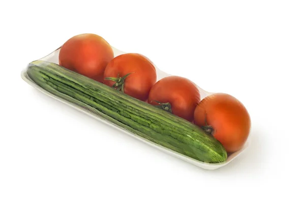 Assorted Red Ripe Tomatoes Cucumber Long Plastic Wrap Lying White — Stock Photo, Image
