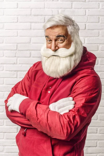 Modern and trendy Santa Claus on the wall background. — Stock Photo, Image