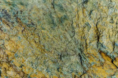 Güzel ve özgün doku. Karmaşık, anlaşılmaz, özgün ve ilginç doku, desen ve arka plan taşı, kaldırım taşı döşeli yakın mesafeden ve makro.