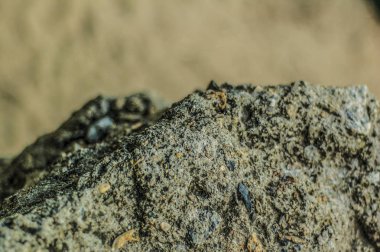 Güzel ve özgün doku. Karmaşık, anlaşılmaz, özgün ve ilginç doku, desen ve arka plan taşı, kaldırım taşı döşeli yakın mesafeden ve makro.