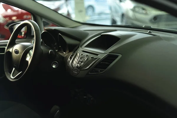 Vintage cars and their elements. Beautiful and stylish cab and control panel of a modern car.