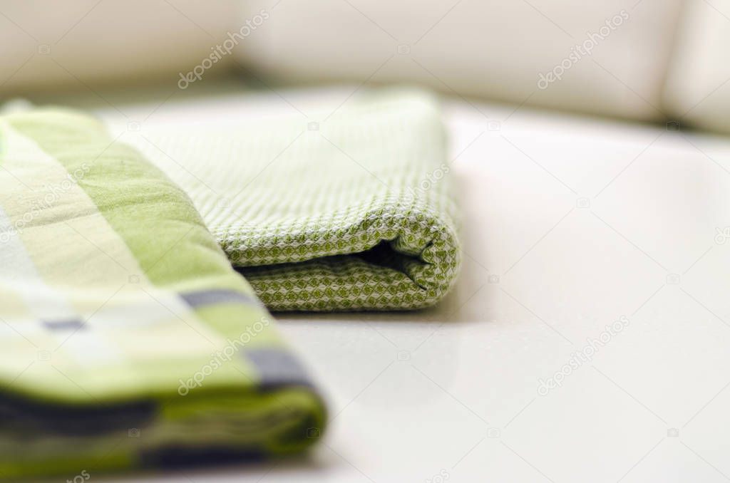 Beautiful and diverse subject. Beautiful two fabrics, sheets, lying on a horizontal surface in the room.