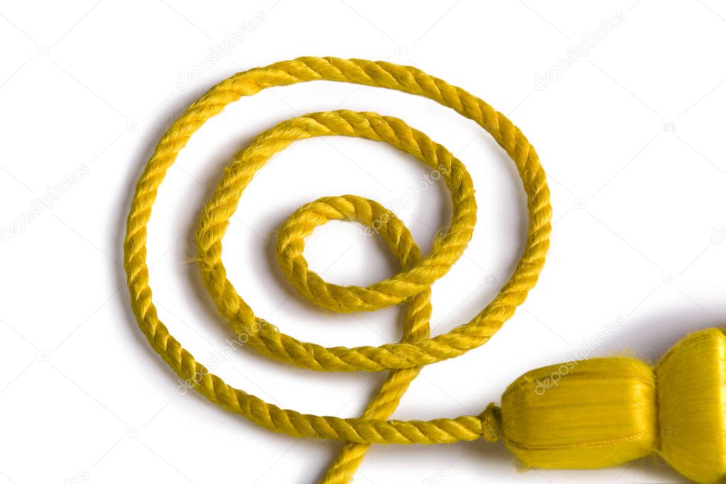 Beautiful and diverse subject. Beautiful and stylish, expensive solid edging, guard and yellow and gold rope for ceremonies, carnivals and parades on a white isolated background.