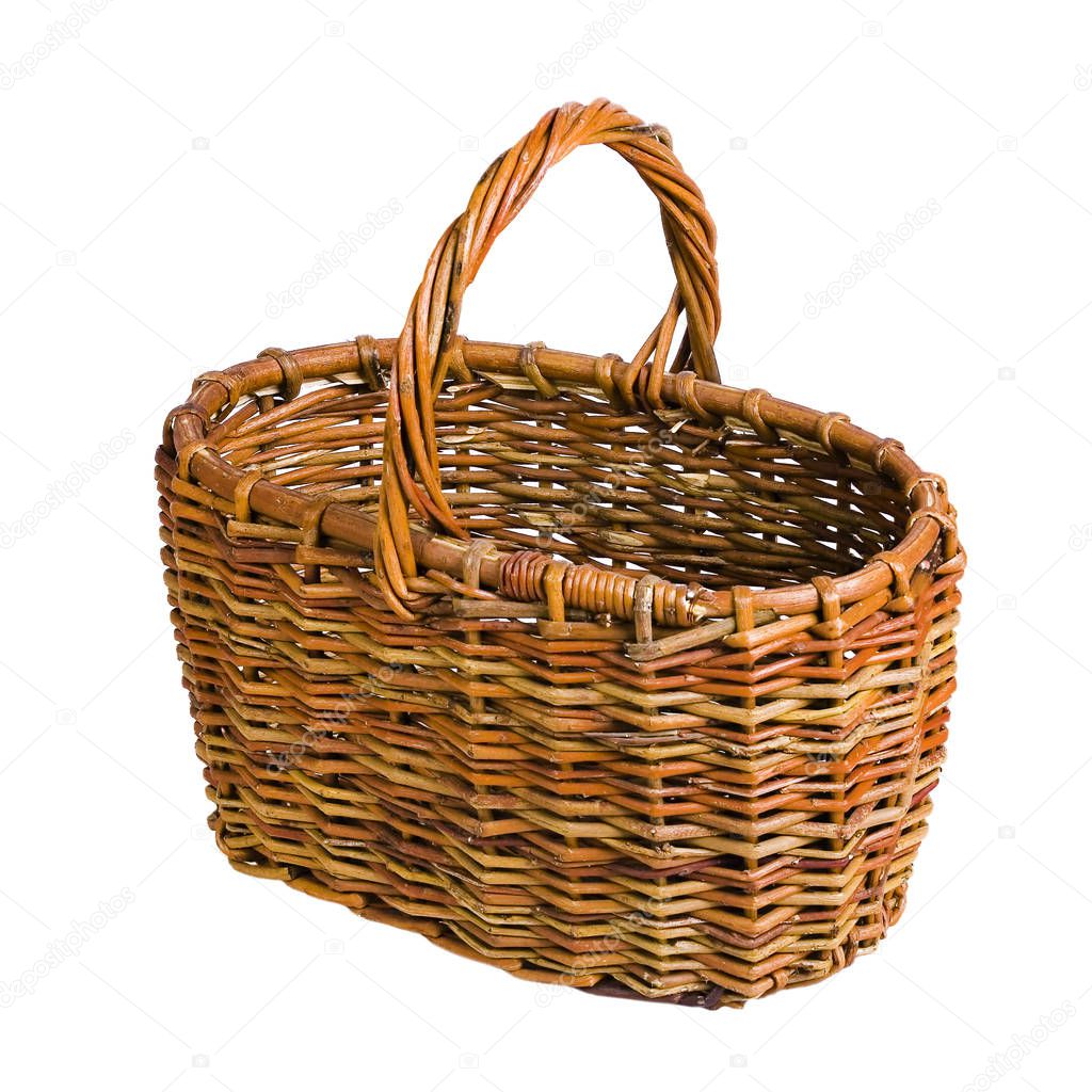 Beautiful and diverse subject. Beautiful and original look and background for an interesting wicker basket of wicker twigs on a white isolated background.