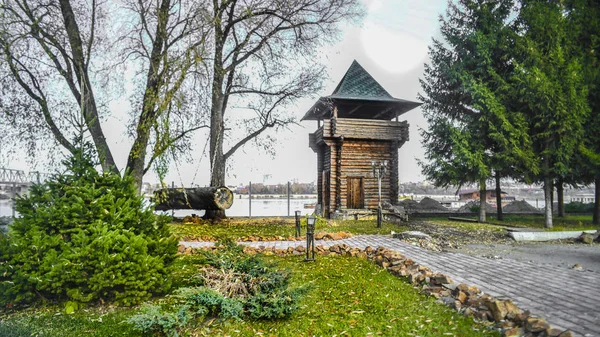 Beautiful homes and objects. Beautiful background, view, panorama, landscape of the city park, garden, public garden with wooden buildings and green areas on a summer or autumn day.