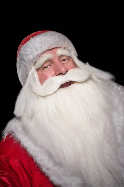 Santa claus op een zwarte achtergrond. — Stockfoto