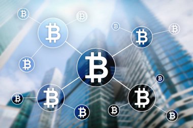 Bulanık gökdelenler arka plan üzerinde Bitcoin cryptocurrency ve blockchain teknoloji kavramı.