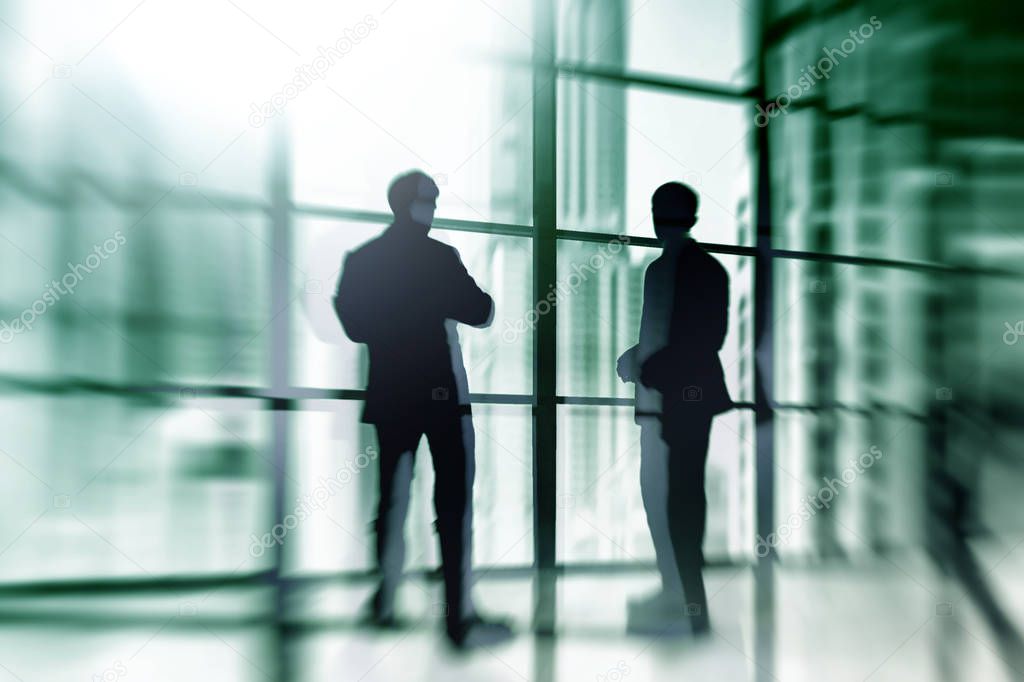 Silhouette of Business People Posing by Window. Silhouette of businessmen on windows. 