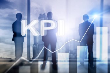KPI - anahtar performans göstergesi grafik üzerinde arka plan bulanık.