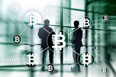 Bulanık gökdelenler arka plan üzerinde Bitcoin cryptocurrency ve blockchain teknoloji kavramı.