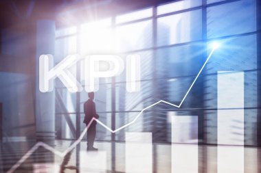 KPI - anahtar performans göstergesi grafik üzerinde arka plan bulanık.