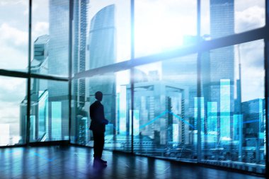 Mali grafikler ve bulanık iş merkezi zemin üzerine. Yatırım ve ticaret kavramı.