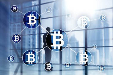 Bulanık gökdelenler arka plan üzerinde Bitcoin cryptocurrency ve blockchain teknoloji kavramı.