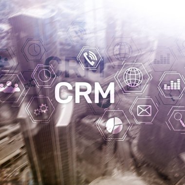 CRM, müşteri ilişkileri yönetimi sistemi kavramı bulanık arka plan üzerinde.