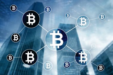 Bulanık gökdelenler arka plan üzerinde Bitcoin cryptocurrency ve blockchain teknoloji kavramı.