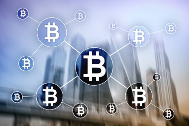 Bulanık gökdelenler arka plan üzerinde Bitcoin cryptocurrency ve blockchain teknoloji kavramı.