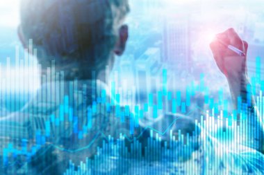 Bulanık ofis merkezi arkaplanındaki borsa şamdanı şeması ve şemalar.