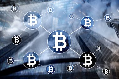 Bulanık gökdelenler arka plan üzerinde Bitcoin cryptocurrency ve blockchain teknoloji kavramı.