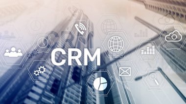 CRM, müşteri ilişkileri yönetimi sistemi kavramı bulanık arka plan üzerinde.