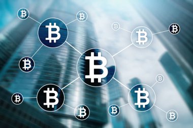 Bulanık gökdelenler arka plan üzerinde Bitcoin cryptocurrency ve blockchain teknoloji kavramı.