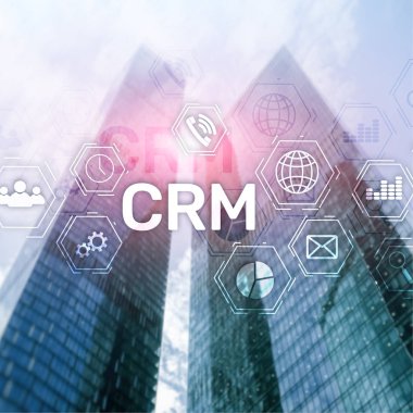 CRM, müşteri ilişkileri yönetimi sistemi kavramı bulanık arka plan üzerinde.