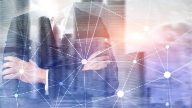 Bulanık gökdelenlerin arkaplanındaki engelleme ağı. Finansal teknoloji ve iletişim konsepti