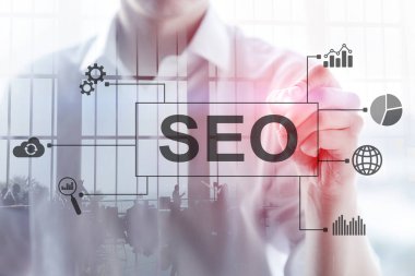 SEO - Bulanık arkaplanda arama motoru optimizasyonu, dijital pazarlama ve internet teknolojisi kavramı.