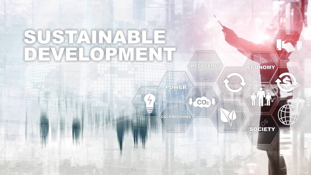 Sustainable development, ecology and environment protection concept. Renewable energy and natural resources. Double exposure of success businessman with abstract building