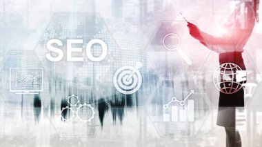 SEO - Bulanık arkaplanda arama motoru optimizasyonu, dijital pazarlama ve internet teknolojisi kavramı
