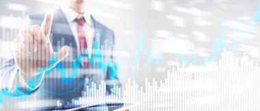 Bulanık ofis merkezi arkaplanındaki borsa şamdanı şeması ve şemalar.