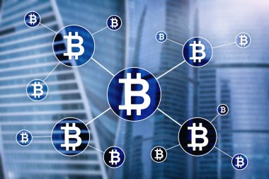 Bulanık gökdelenler arka plan üzerinde Bitcoin cryptocurrency ve blockchain teknoloji kavramı.
