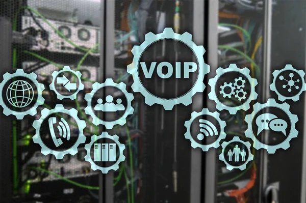 VoIP Voice over IP on the screen with a blur background of the server room. The concept of Voice over Internet Protocol.