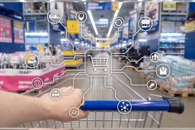 E-ticaret alışveriş otomasyon kavramı bulanık süpermarket arka plan üzerinde perakende pazarlama kanalları.